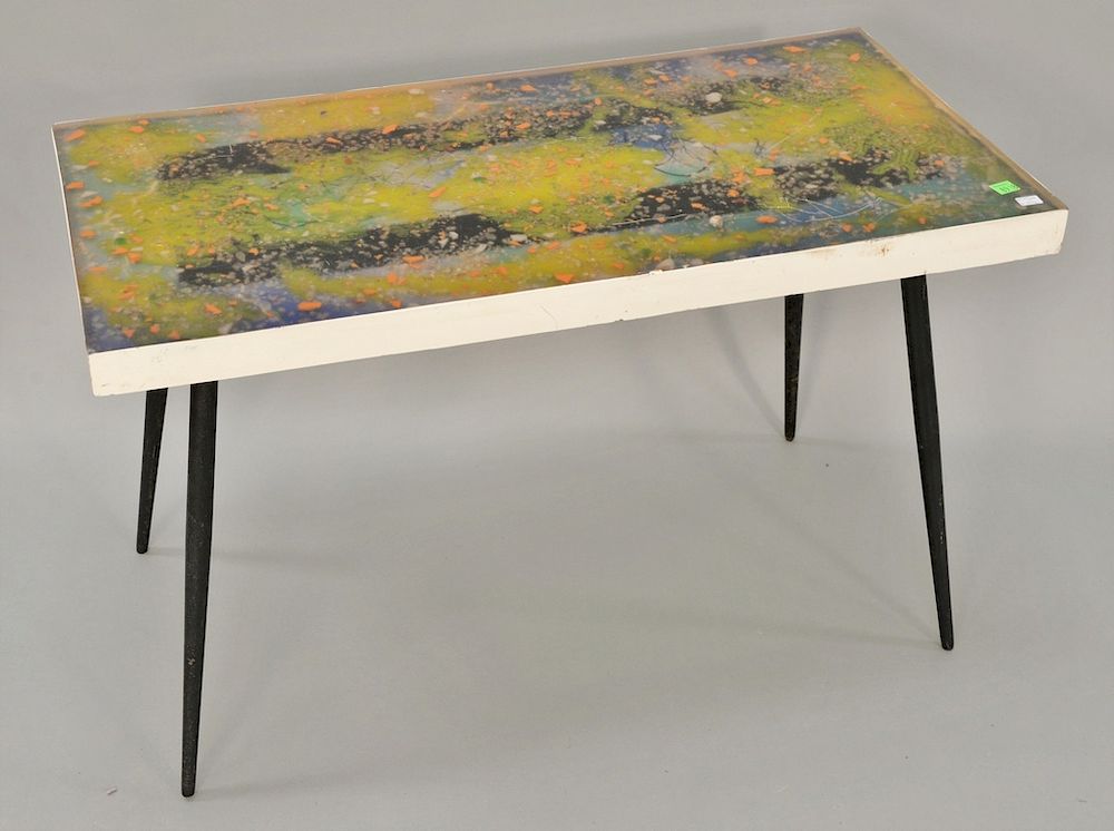 Appraisal: French modern resin table on wrought iron tapered legs ht