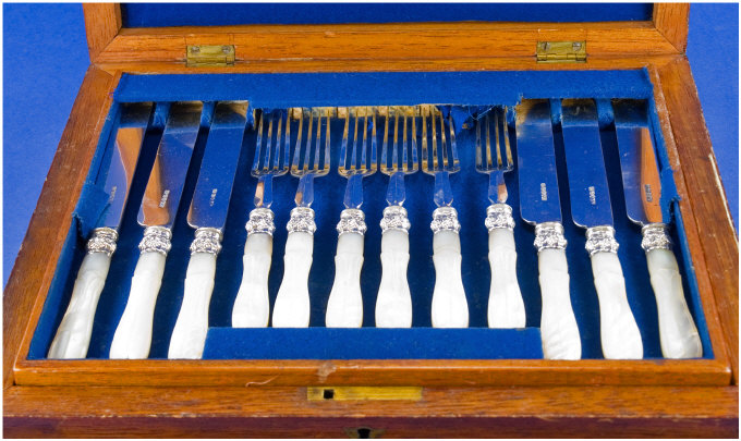 Appraisal: Cased Set Of Desert Knives And Forks With Mother Of