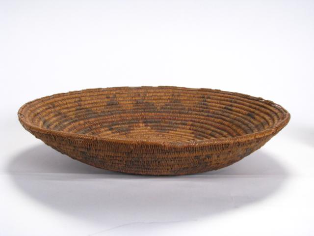 Appraisal: Native American reed basket with repeating geometric design