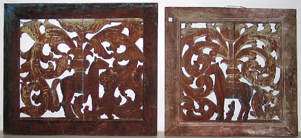 Appraisal: A pair of Indian style reticulated wood panels With vegetal