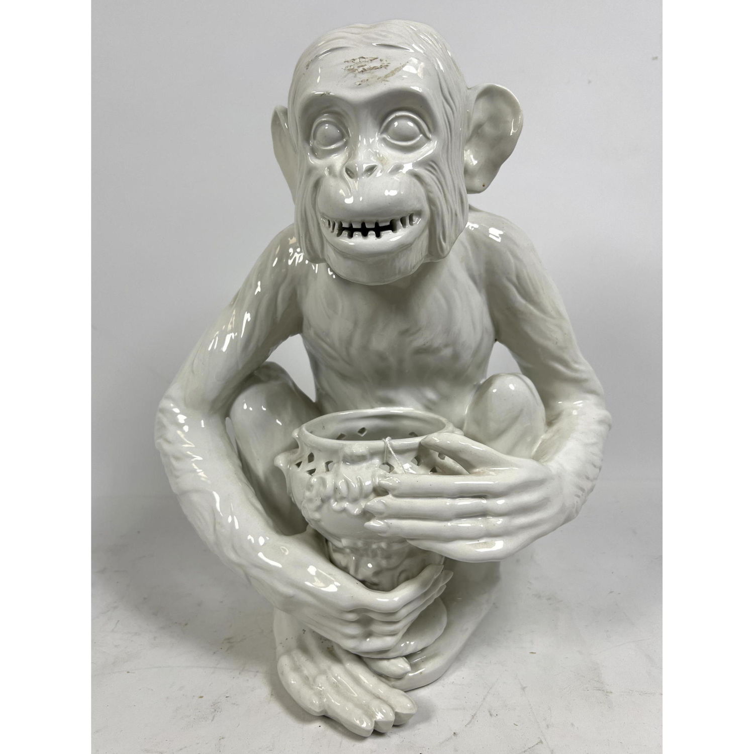 Appraisal: White ceramic monkey Made in Italy Dimensions H inches W