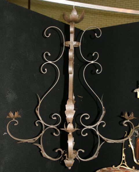 Appraisal: A French four light iron pendant