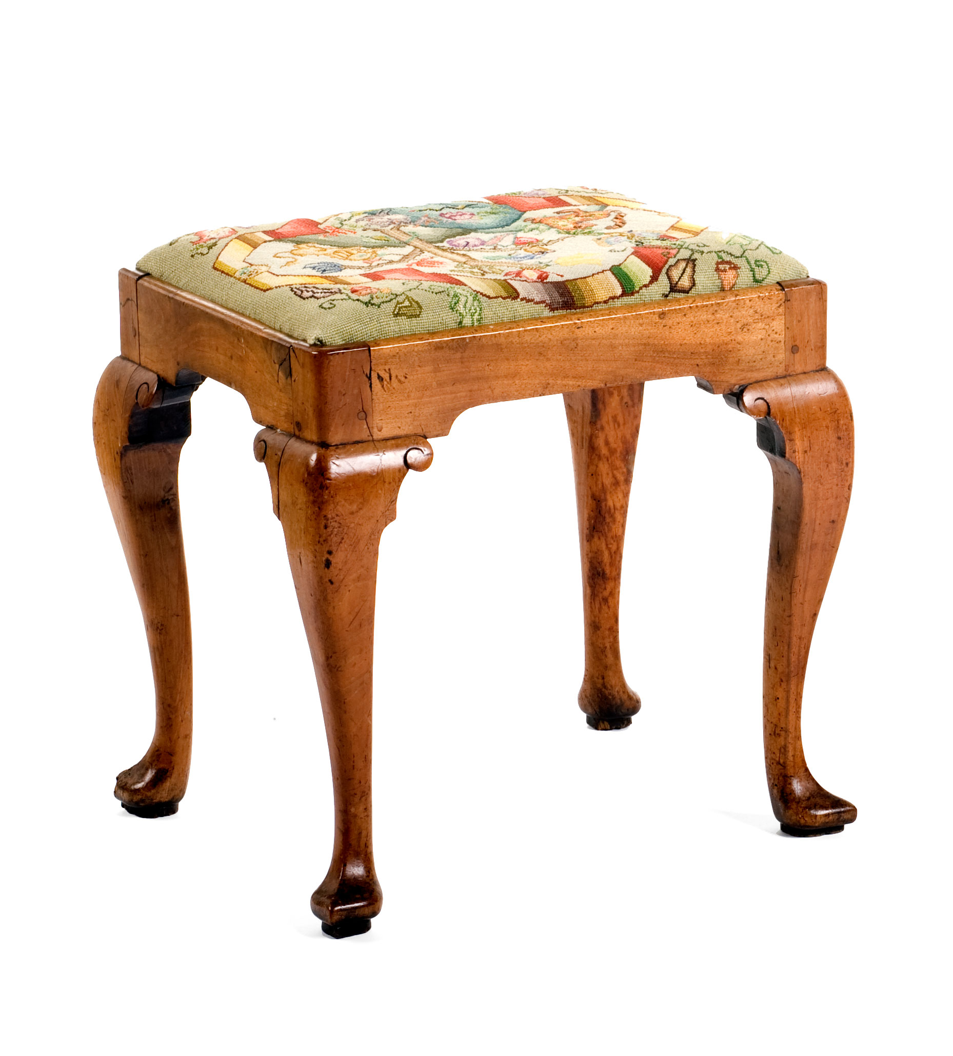 Appraisal: ENGLISH QUEEN ANNE WALNUT FOOTSTOOL The rectangular slip seat above