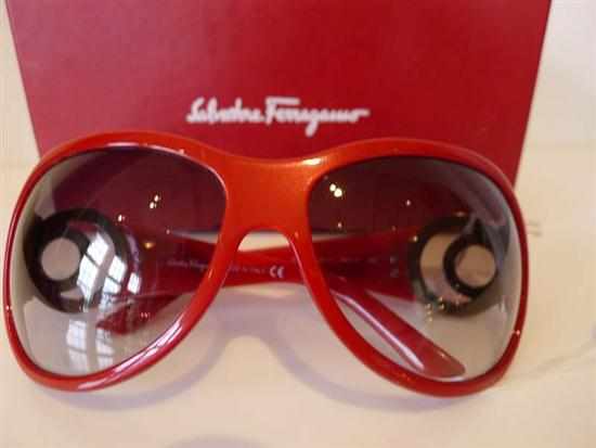 Appraisal: A PAIR OF SUNGLASSES BY SALVADORE FERRAGAMO STYLED IN RED