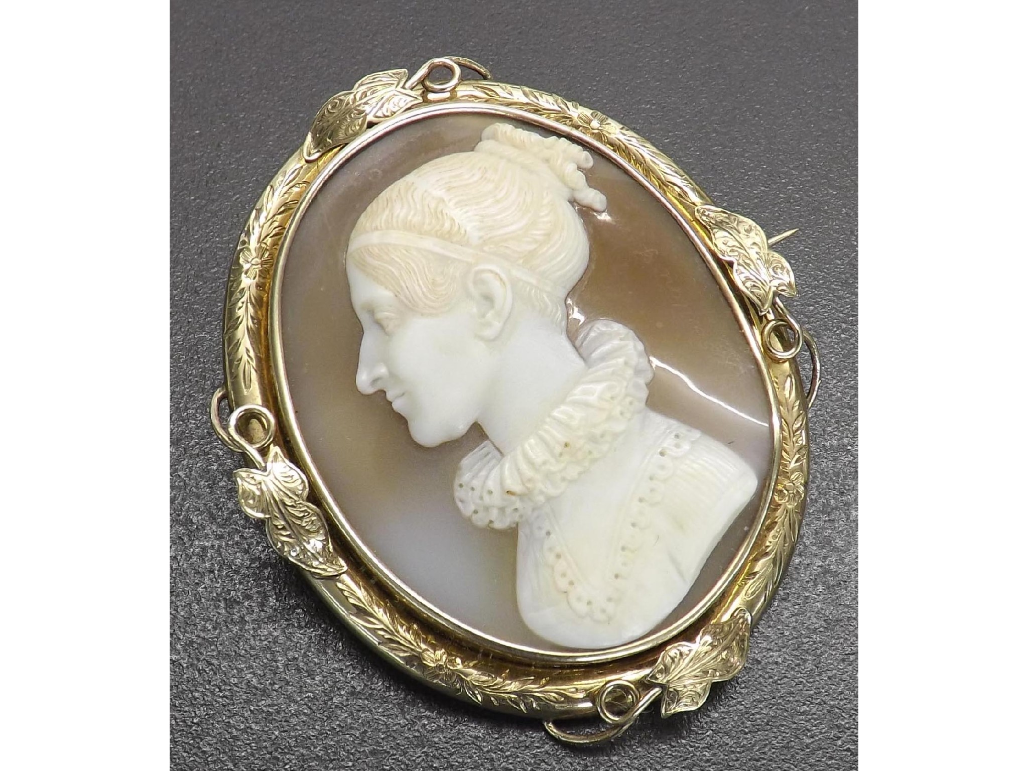 Appraisal: Victorian carved shell oval cameo brooch depicting a lady wearing