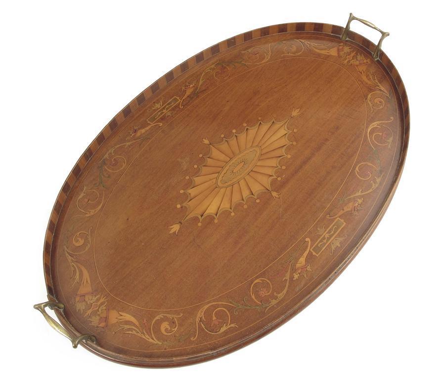 Appraisal: A late Victorian mahogany and marquetry oval tray