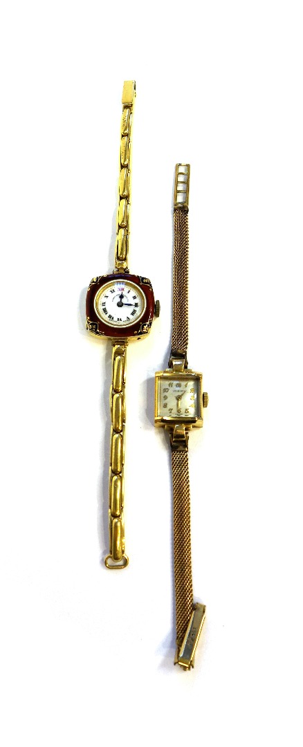 Appraisal: A lady's gold cased and enamelled curved square cased wristwatch