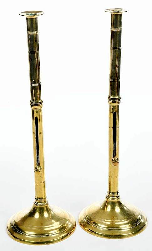 Appraisal: Large Pair Brass Push-Up Candlesticks British th century wide pedestal