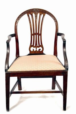 Appraisal: A George III mahogany open armchair with carved decoration and