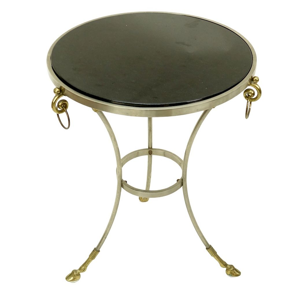 Appraisal: Steel Brass and Granite Gueridon Neo-classical style Steel Brass and