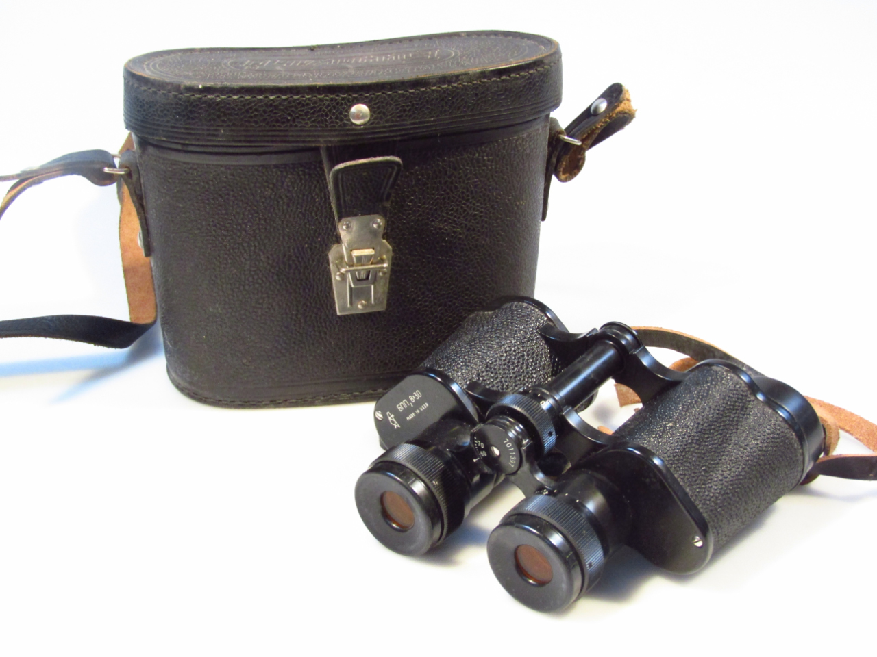 Appraisal: A pair of Russian binoculars x with metal articulated centres