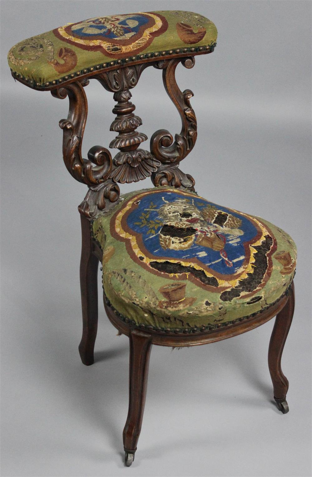 Appraisal: VICTORIAN CARVED CHERRYWOOD COCK FIGHTING CHAIR WITH NEEDLEWORK UPHOLSTERY having