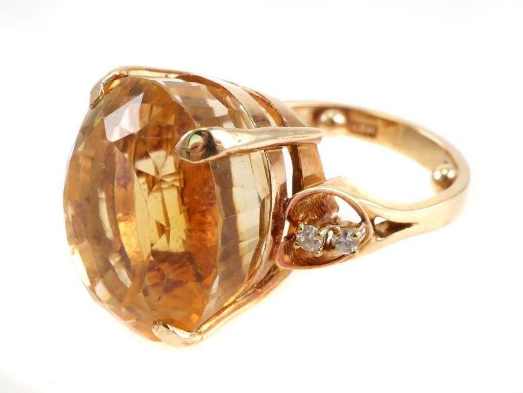 Appraisal: Massive VVS carat citrine flanked by four pt diamonds Total