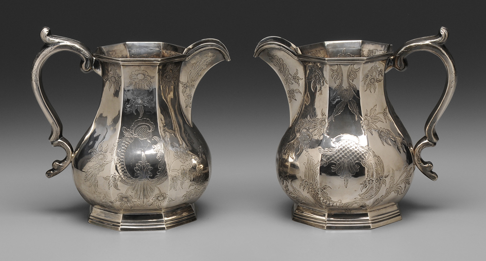 Appraisal: Pair Coin Silver Pitchers American paneled bodies with engraved floral