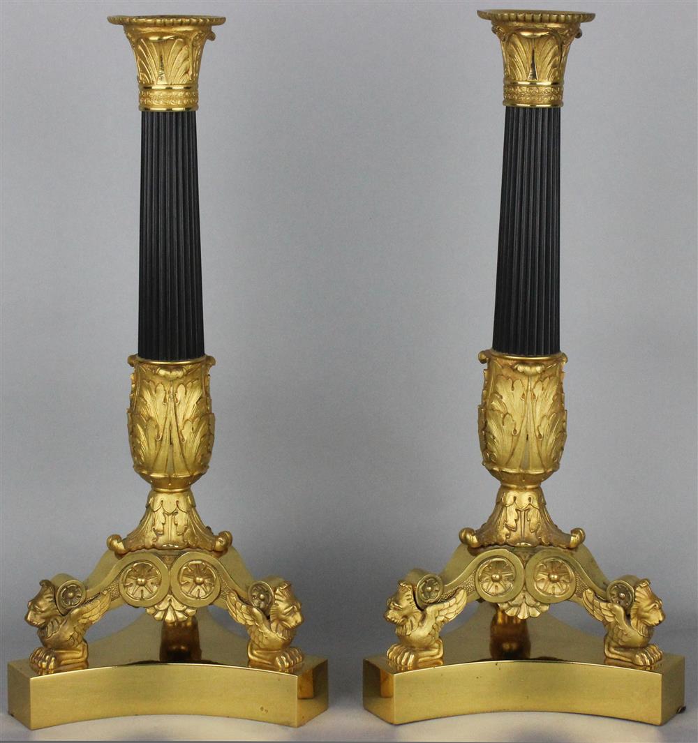 Appraisal: PAIR OF REGENCE STYLE GILT BRONZE AND EBONIZED CANDLESTICKS h