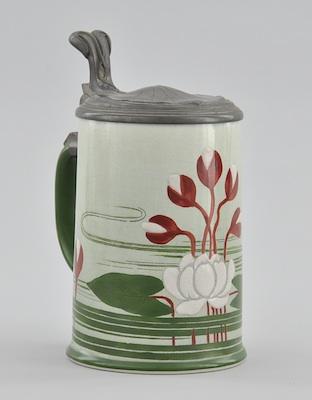 Appraisal: An Art Nouveau Style Decorated Stein With a hinged pewter