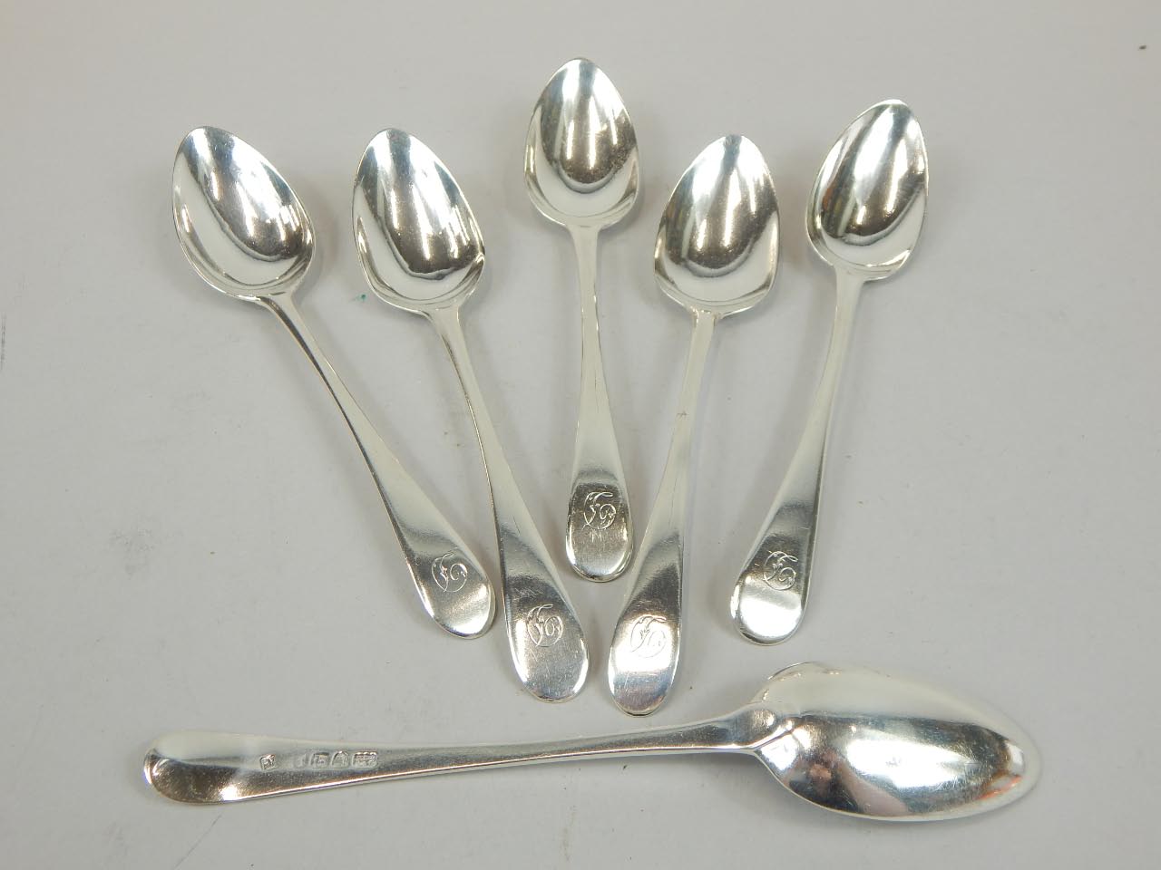 Appraisal: A set of five William IV silver dessert spoons Old