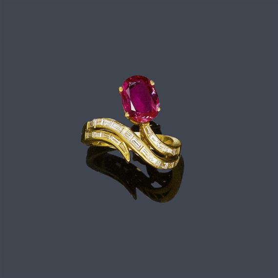 Appraisal: RUBY AND DIAMOND RING Yellow gold Fancy asymmetric snake-like ring