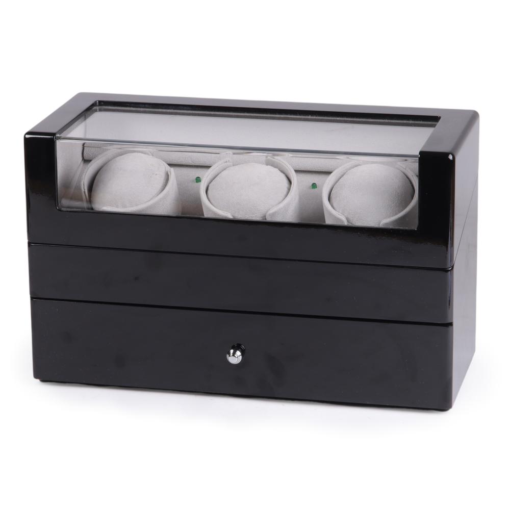 Appraisal: Black lacquer three watch winder with drawer for five watches