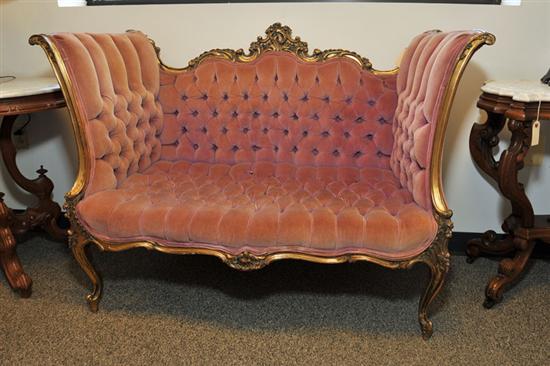 Appraisal: SETTEE Gold painted ornately carved settee with pink button back