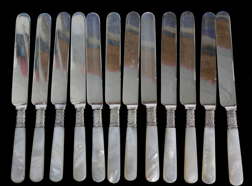 Appraisal: Set of Mother of Pearl Handle Dessert Knives Set of