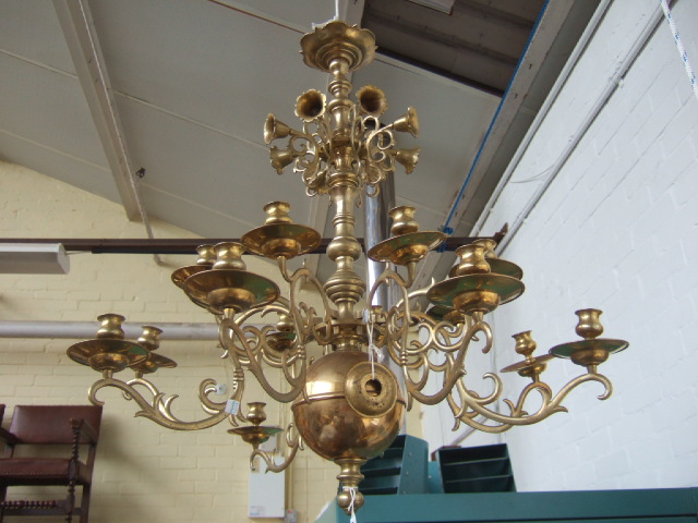 Appraisal: A Dutch brass sixteen light chandelier mid th century the