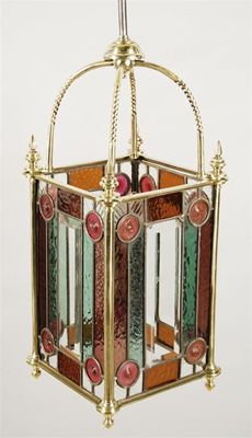 Appraisal: A Victorian brass hall lantern with leaded stained glass panels