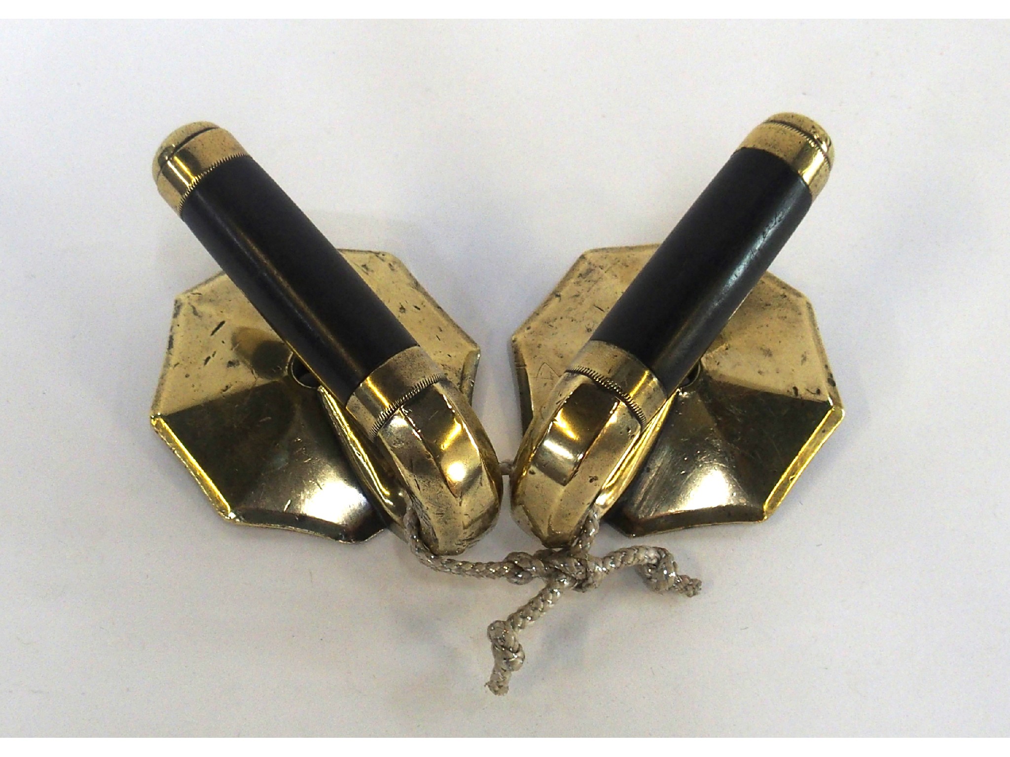 Appraisal: A pair of curling stone handles by Leckie Co