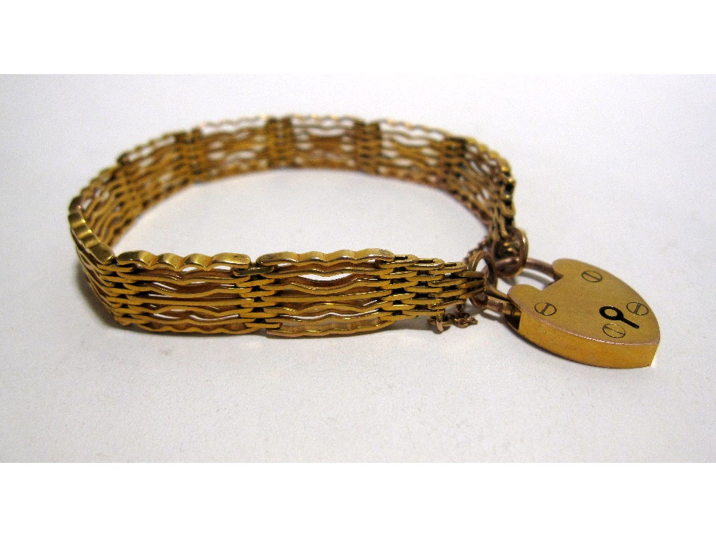 Appraisal: Nine carat gold seven bar gate bracelet Approx gms