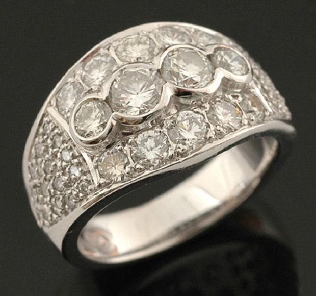 Appraisal: A diamond dress ring Comprising four principal bezel set round