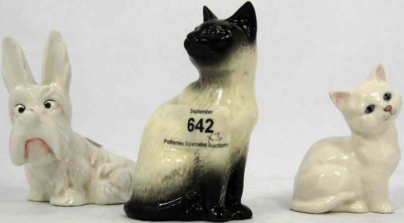 Appraisal: Beswick Models Comical Dog with Ladybird on Nose Siamese Cat