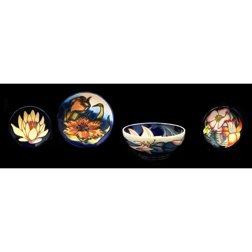 Appraisal: A Moorcroft bowl and three dishes early st c various