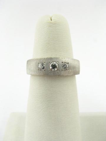 Appraisal: K white brushed gold ring with three diamonds size