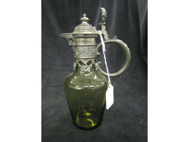 Appraisal: Victorian Emerald Glass Syrup Pitcher pewter trim figural spout circa