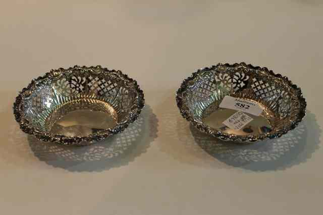 Appraisal: A PAIR OF SILVER BON BON DISHES of circular form