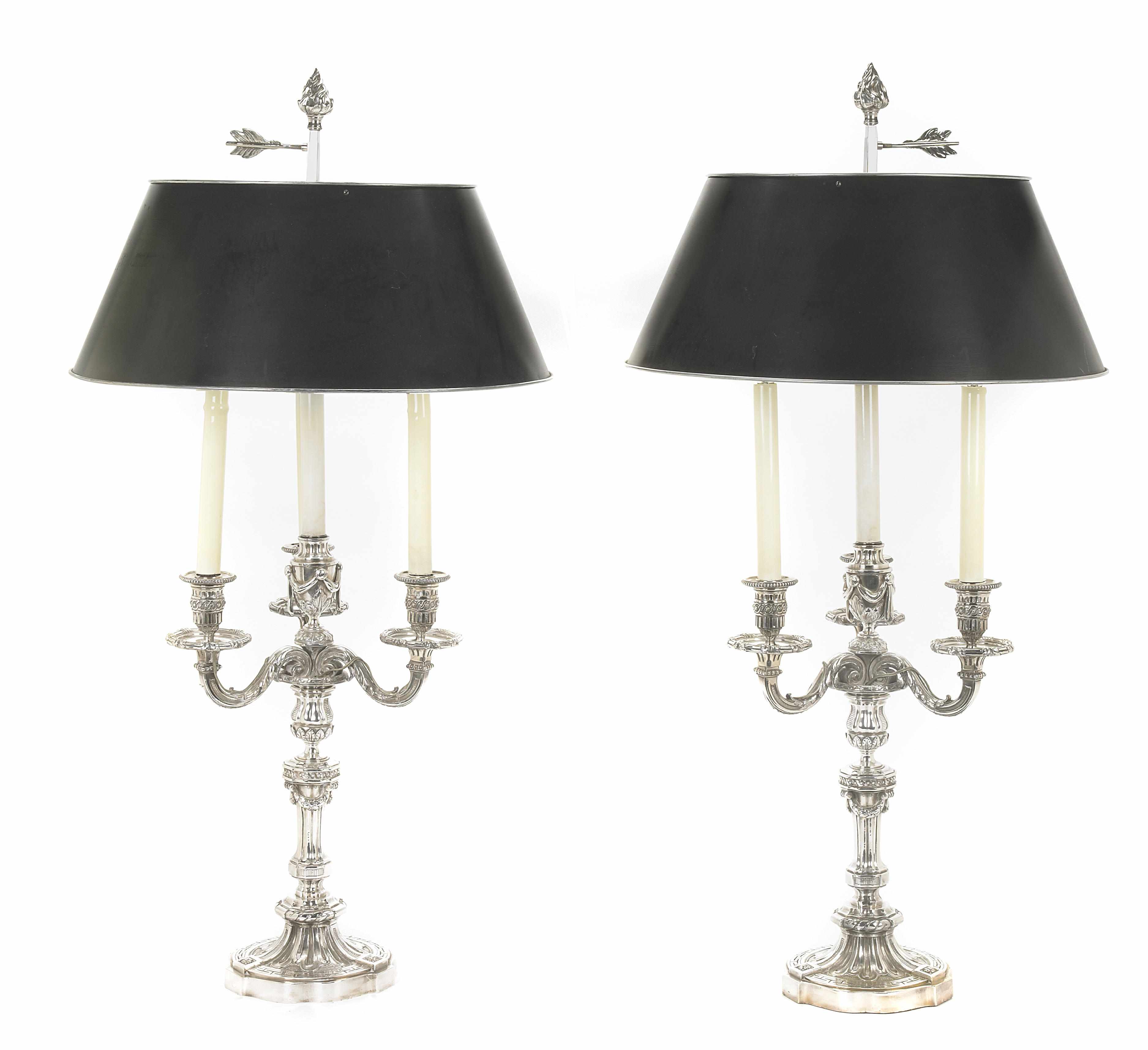 Appraisal: A pair of Louis XVI style silvered bronze four light