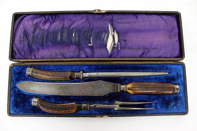 Appraisal: A TH CENTURY THREE PIECE CARVING SET by Levesley Bros