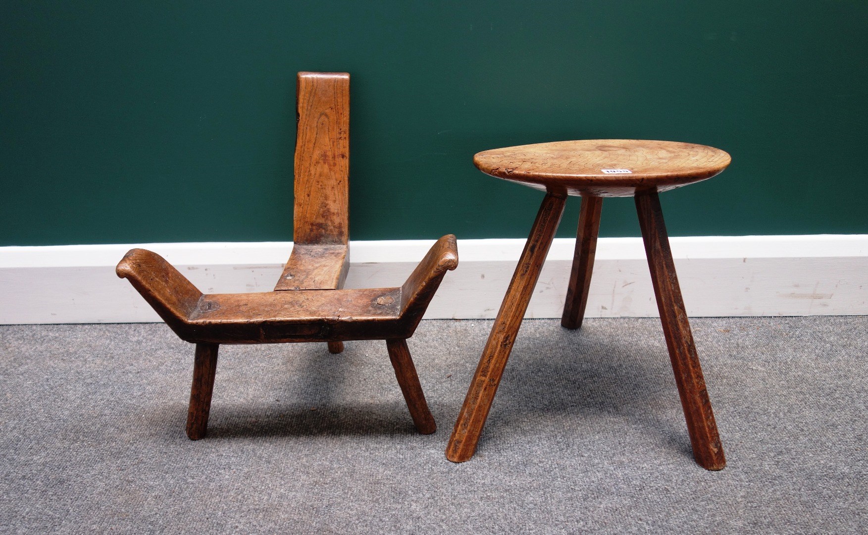 Appraisal: A George III elm and ash oval stool on three