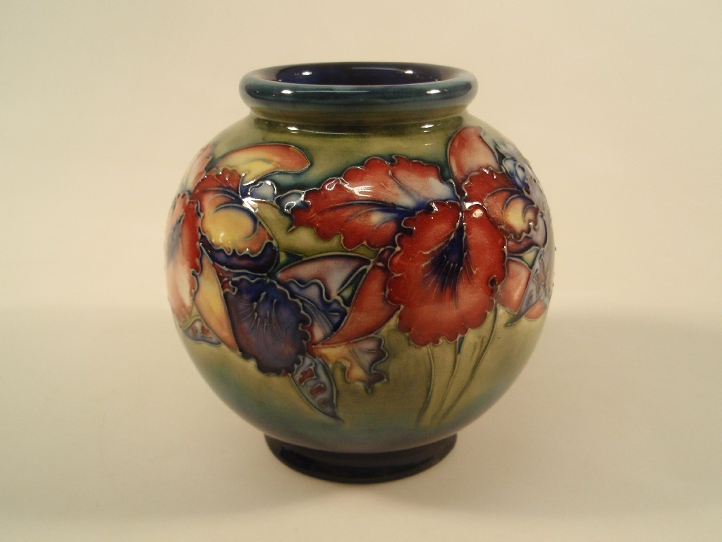 Appraisal: A Moorcroft pottery spherical vase tube lined and painted with