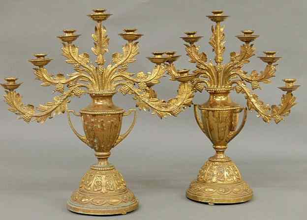 Appraisal: Large pair of brass candelabra th c with grape vine