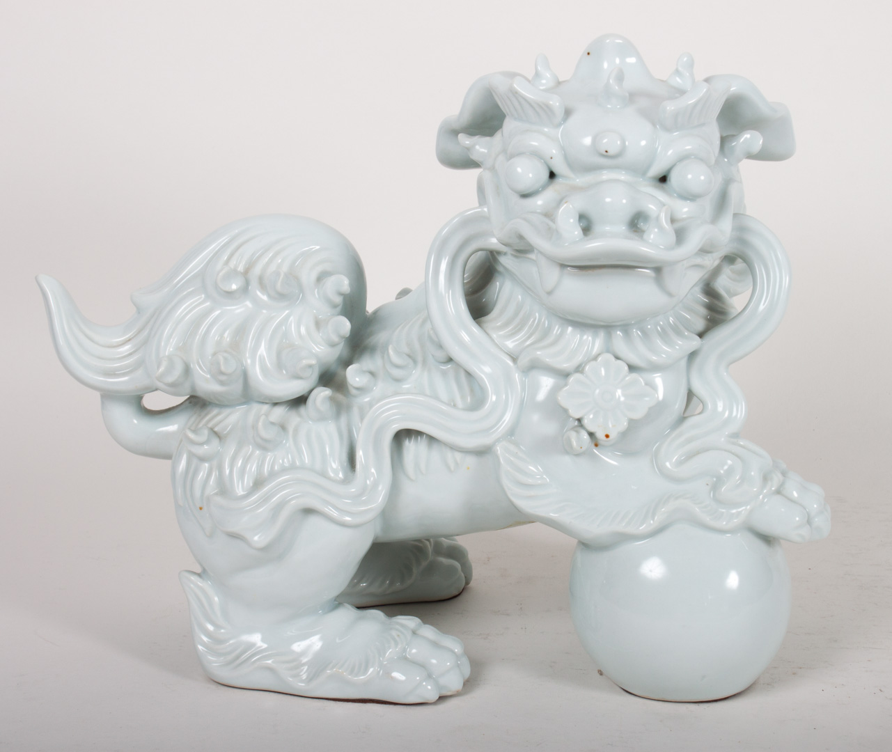 Appraisal: Chinese celadon porcelain foo dog in H in L Condition