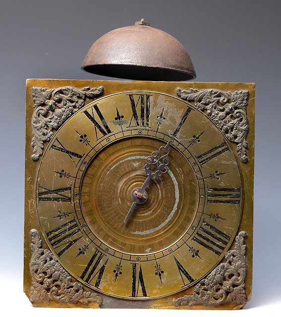 Appraisal: AN EARLY HOOK AND SPIKE WALL CLOCK the square brass