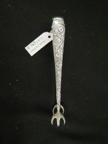 Appraisal: Sterling Silver Repousse Tongs elaborate florals paw ends excellent no