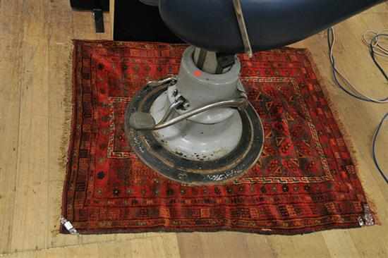 Appraisal: A RED AFGHAN PRAYER RUG