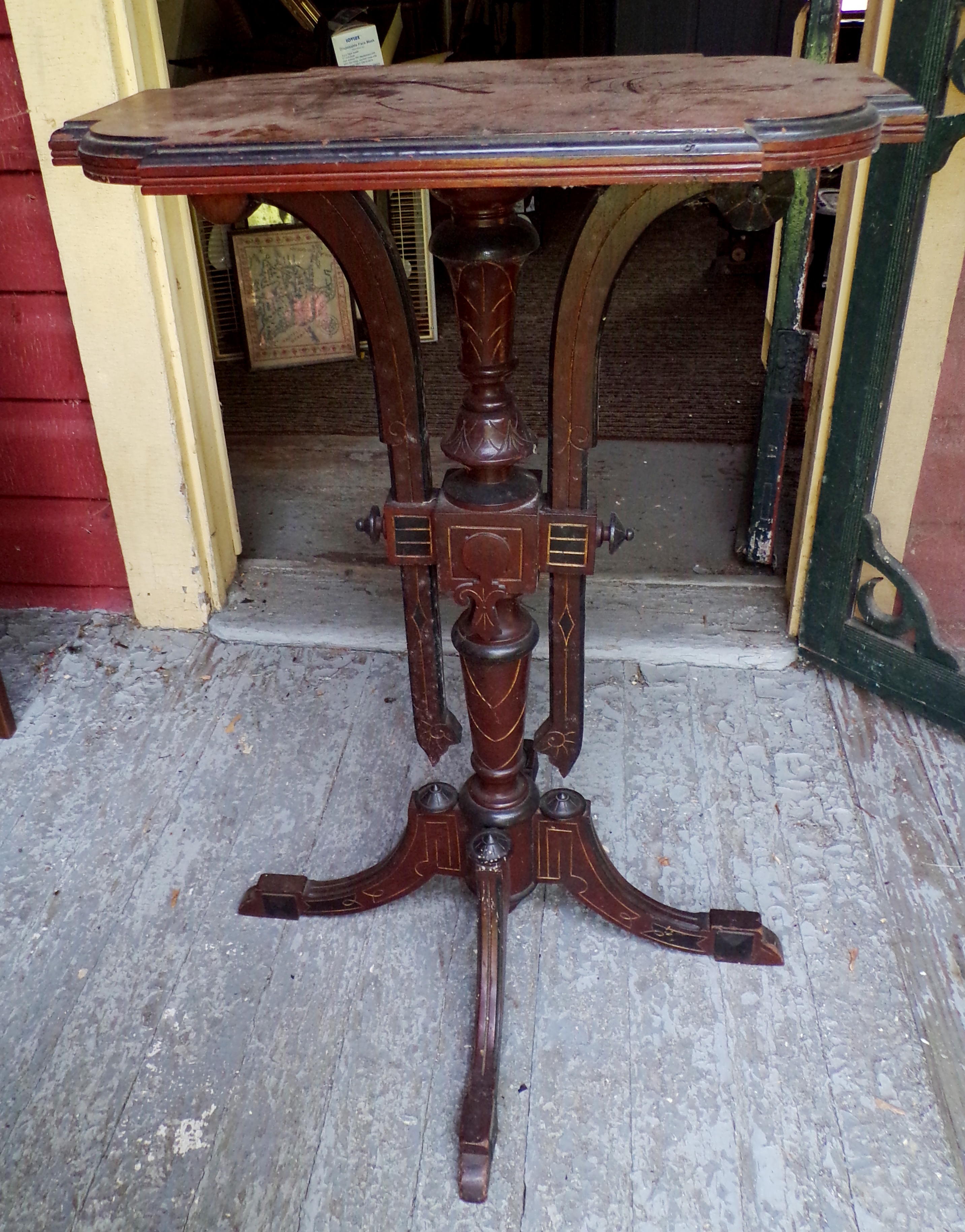 Appraisal: Walnut occasional table with ebonized and incised decoration x x