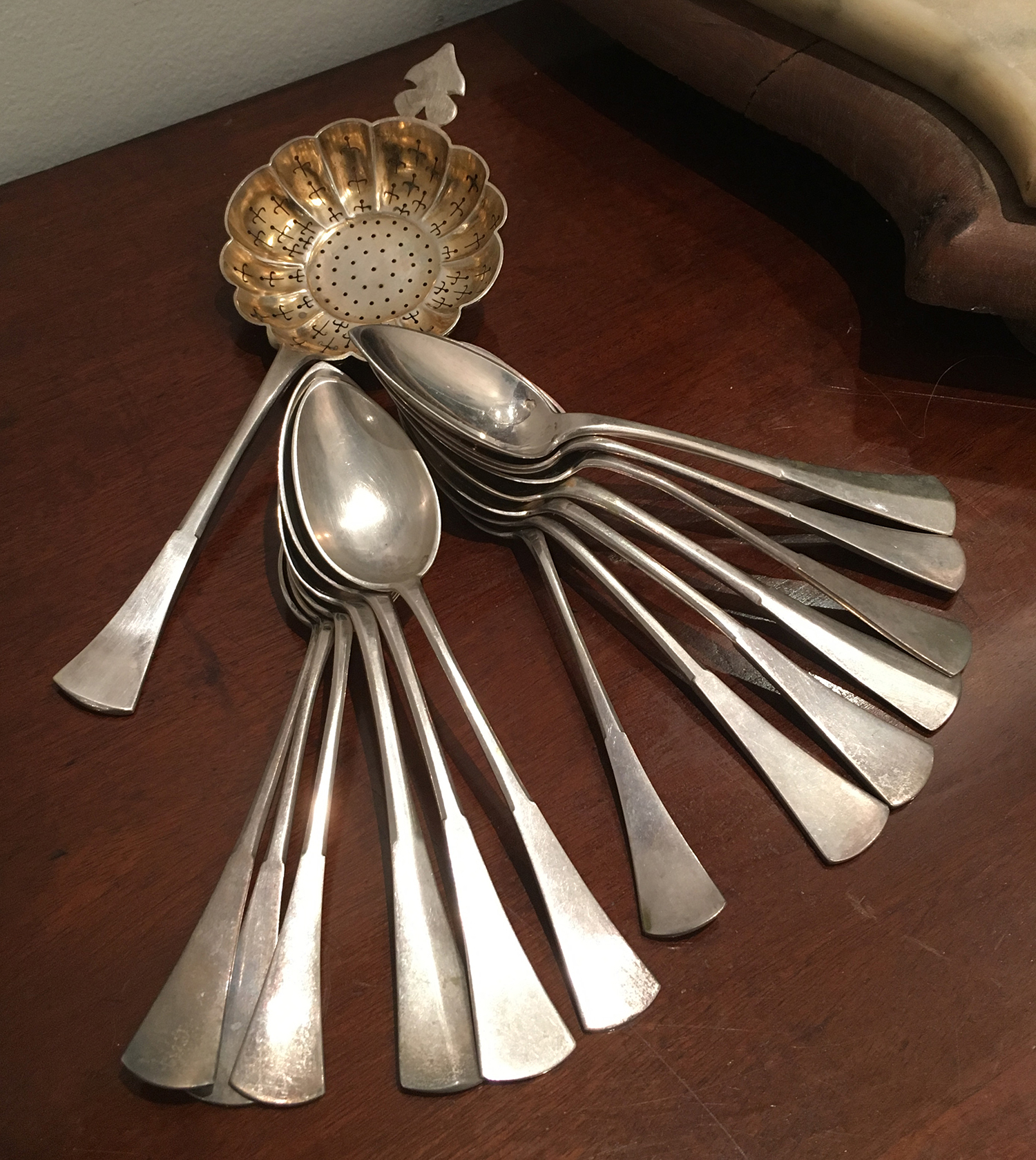 Appraisal: AN ART DECO AUSTRIAN SILVER SET OF GRAPEFRUIT SPOONS TOGETHER