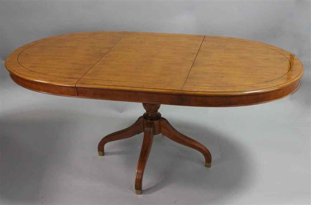 Appraisal: DREXEL HERITAGE OVAL DINING TABLE WITH ONE LEAF the leaf