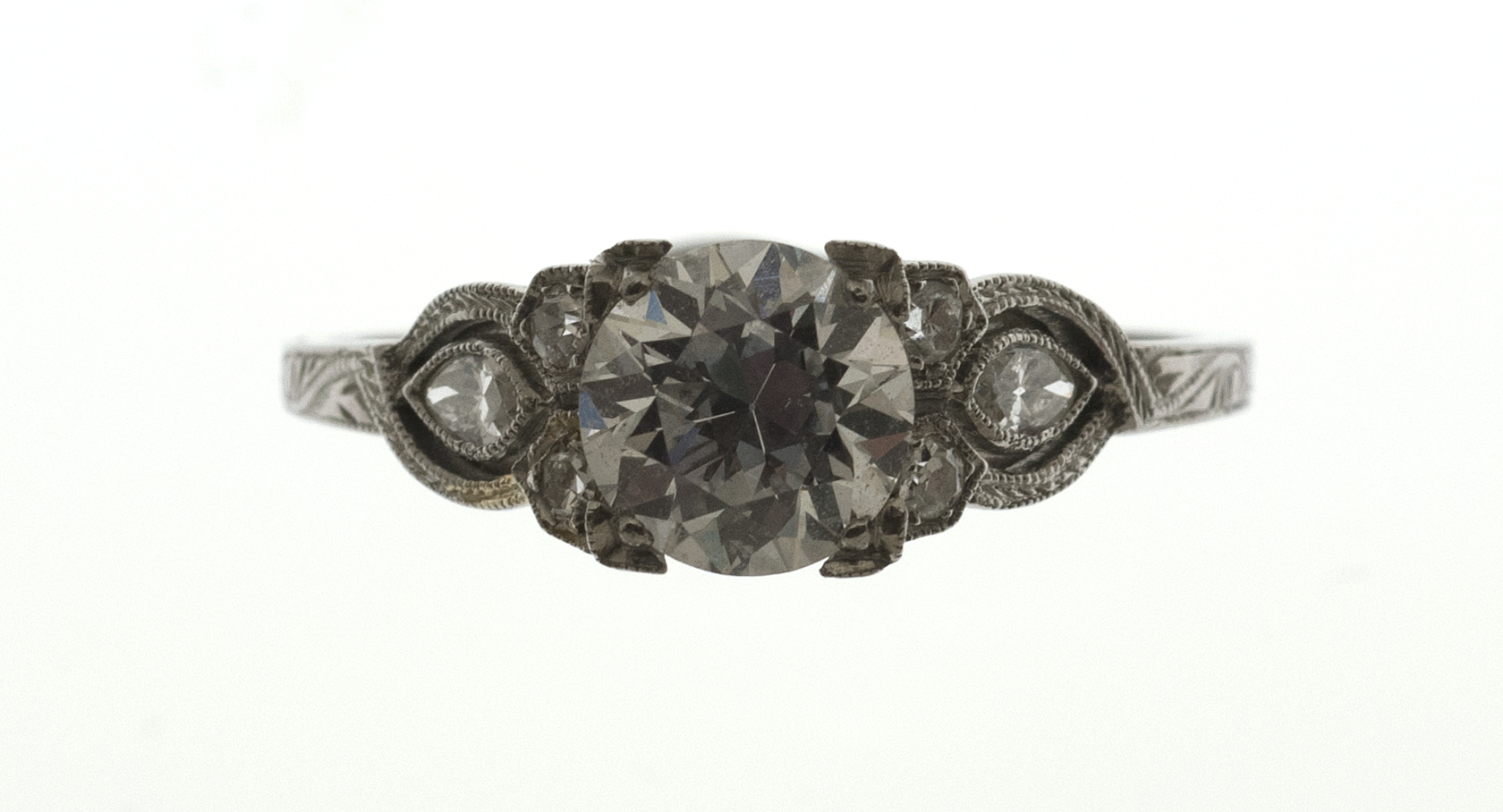 Appraisal: EDWARDIAN PLATINUM AND DIAMOND RING Set with six small diamonds