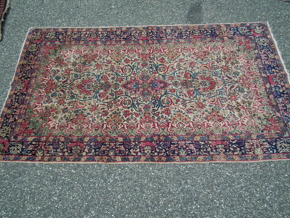 Appraisal: KIRMAN SCATTER RUG Old Lavar Kirman scatter rug with ivory