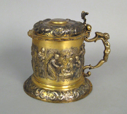 Appraisal: German silver gilt tankard th c with relief decoration of